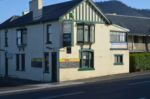 Gabled corner of the inn with a board reading Bush Inn est 1815, Australia's oldest licensed hotel