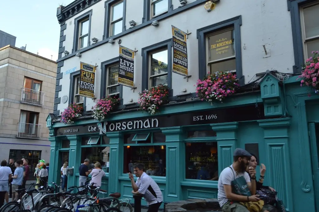 The green-painted Norseman in Temple Bar, its name and EST. 1696 across the front