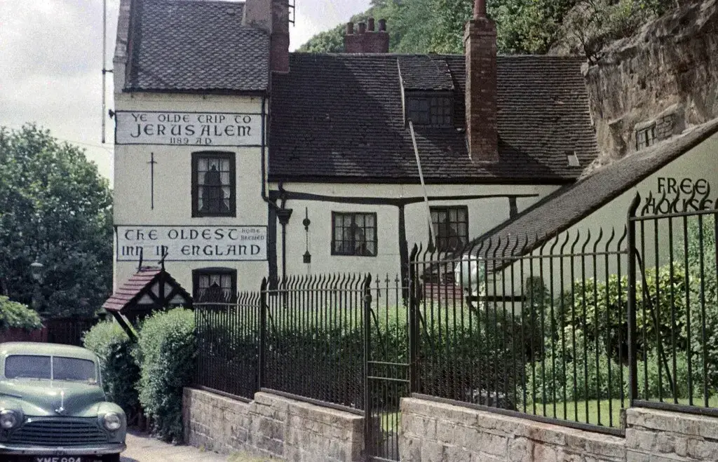 Ye Olde Trip to Jerusalem in 1962, its painted boards weathered and a Morris Minor parked at the kerb